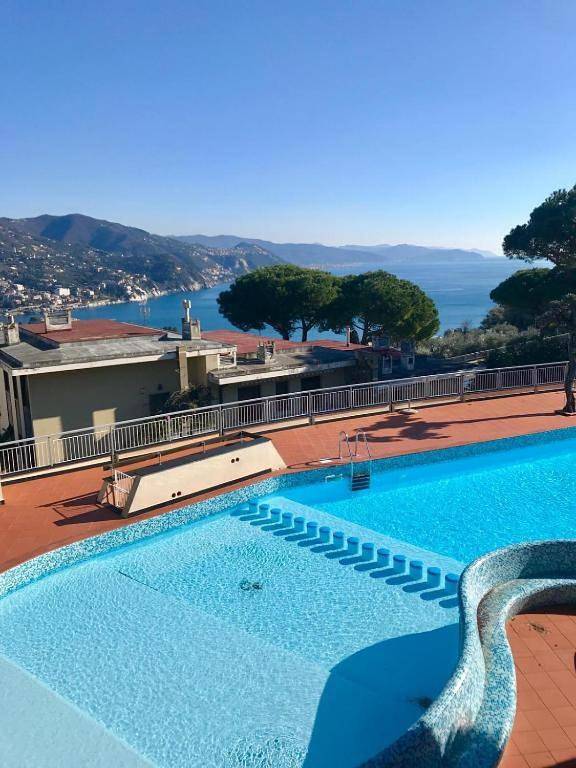 Casa vacanza per 9 persone, con Balcone e Terrazza nonché Piscina e Panorama in San Michele di Pagana