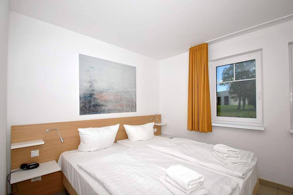 Ganze Wohnung, Strandnahe Fewo mit Terrasse, Schwimmbad- und Saunanutzung - Rex Rugia Fewo 30-4 in Lobbe, Mönchgut