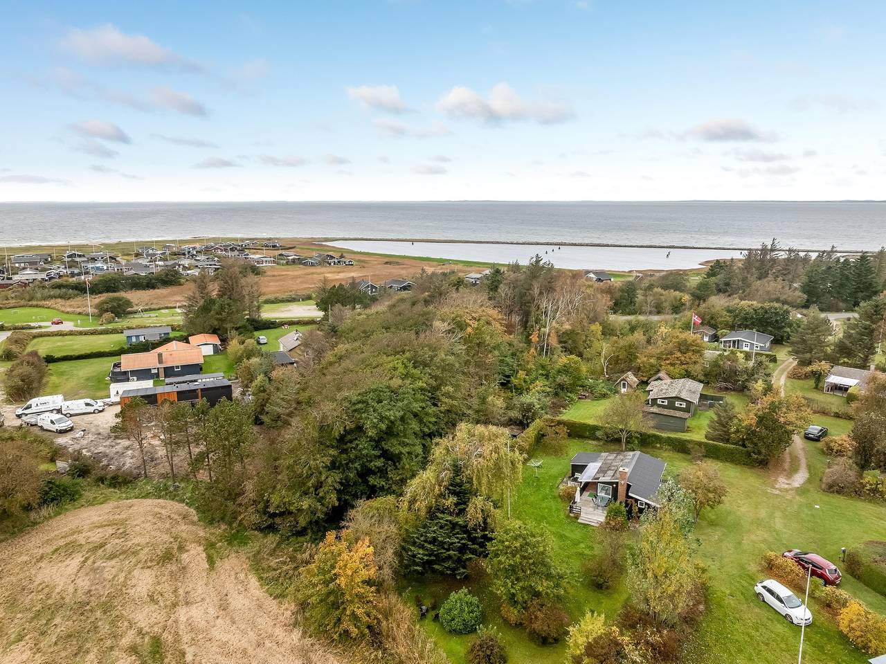 Cozy holiday home with terrace and wood-burning stove close to the water. in Limfjord in Nordjütland