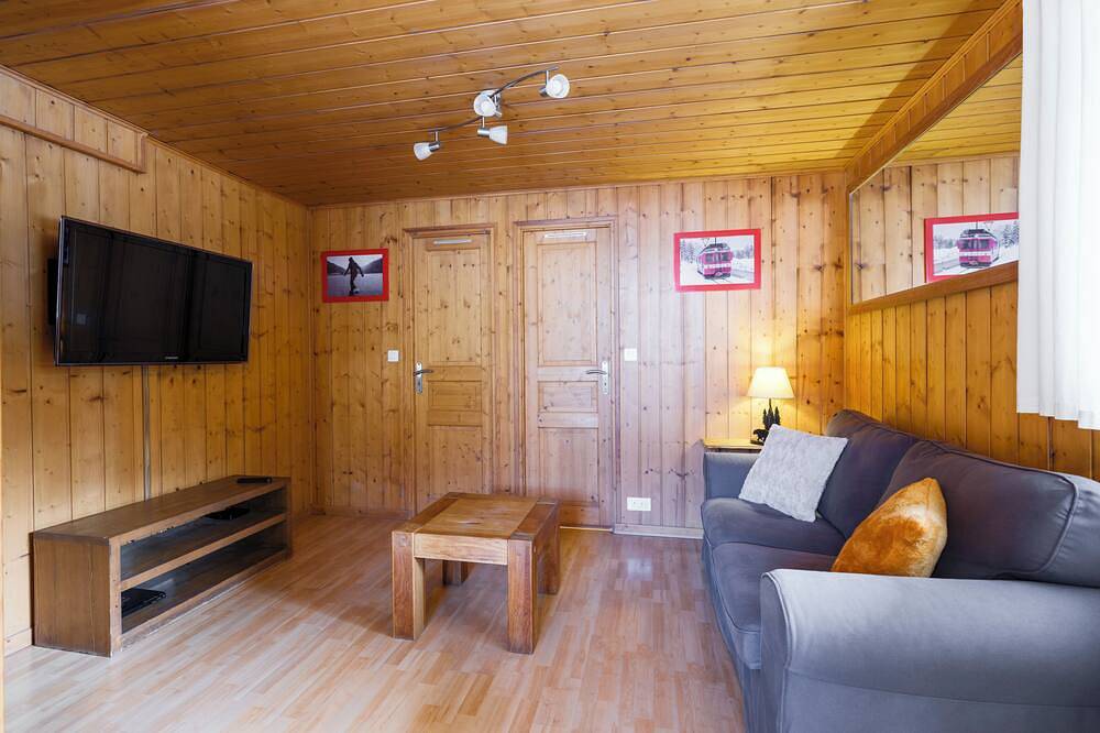 Apartamento entero, Apartamento cerca de las pistas, tranquilo y confortable en la estación de los pelirrojos. in Lamoura, Parc naturel régional du Haut-Jura