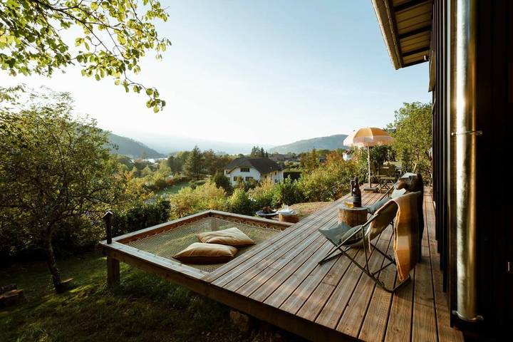 Appartement de vacances pour 4 personnes, avec Jacuzzi et Terrasse ainsi que Jardin et Vue sur le Lac d'Annecy