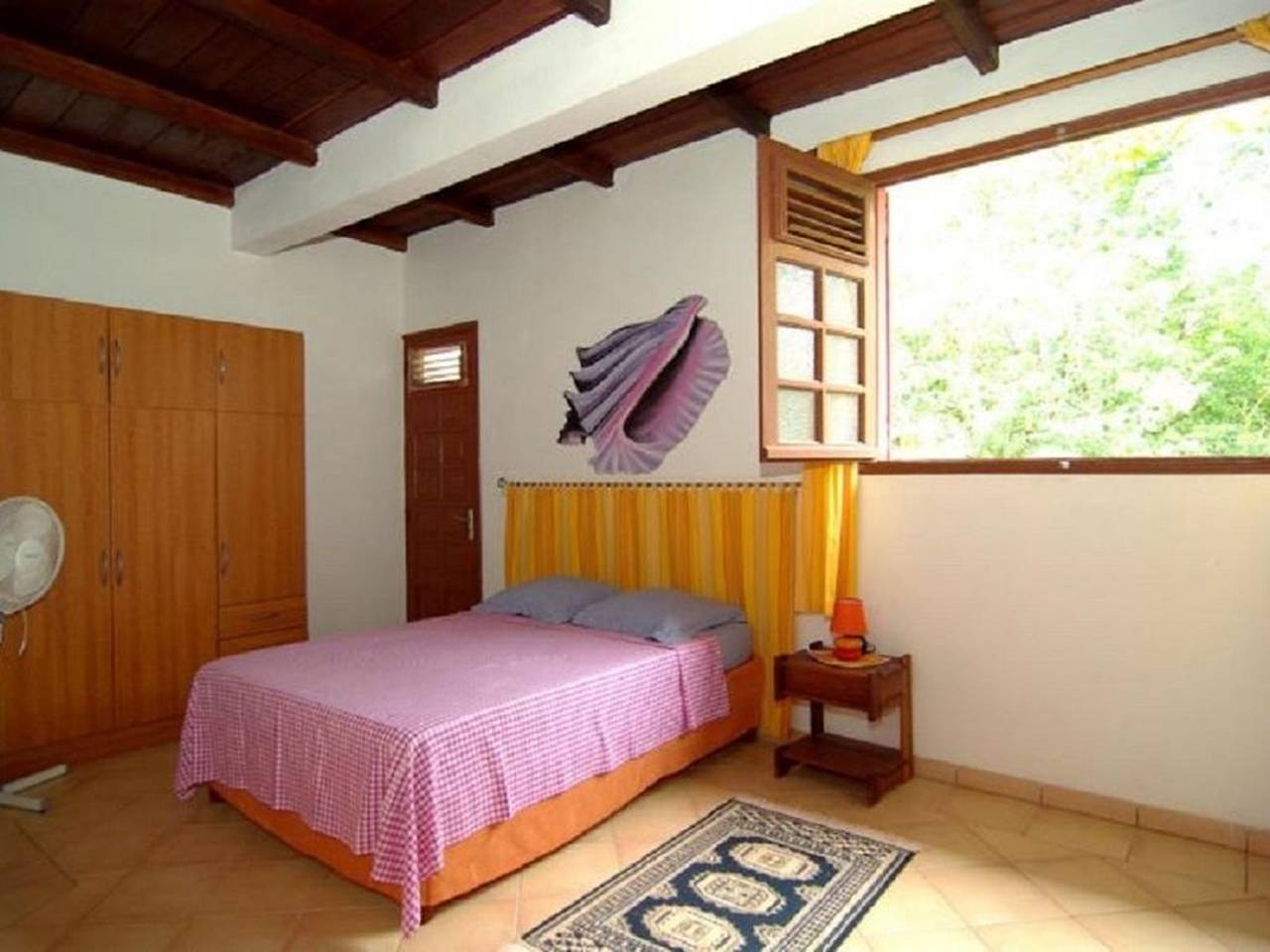 Entire apartment, Welcoming Apartment in Le Robert with Balcony and Garden in Le Robert, Martinique