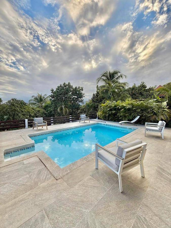 Maison de vacances pour 7 personnes, avec jardin et piscine ainsi que vue et terrasse à Petit-Bourg