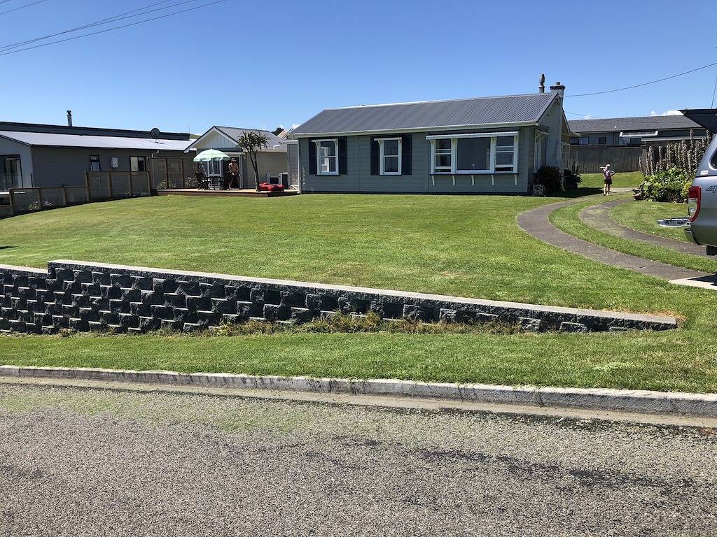 Kai Iwi Beach House. In der Nähe eines fantastischen Westküstenstrandes. Erstaunliche Aussichten. in Manawatu-Wanganui