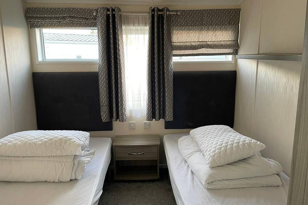 Lovely 6 berth lodge with decking at Lyons Lido Beach, North Wales in Prestatyn, Denbighshire