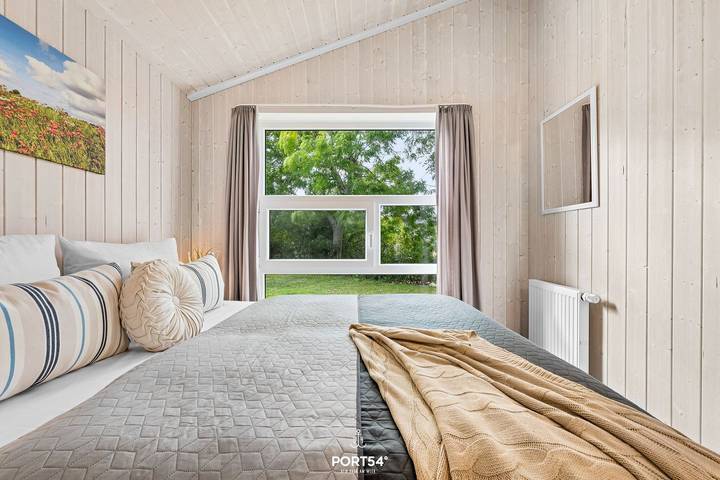 Hellig Hus am Strand - Whirlwanne, finn. Sauna, 2 Duschen, Kaminofen, Terrasse in Schönhagen, Brodersby