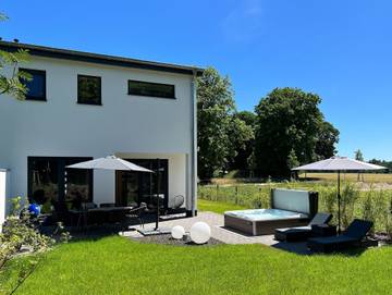 Ferienhaus für 7 Personen, mit Garten und Terrasse sowie Sauna, kinderfreundlich in Göhren-Lebbin
