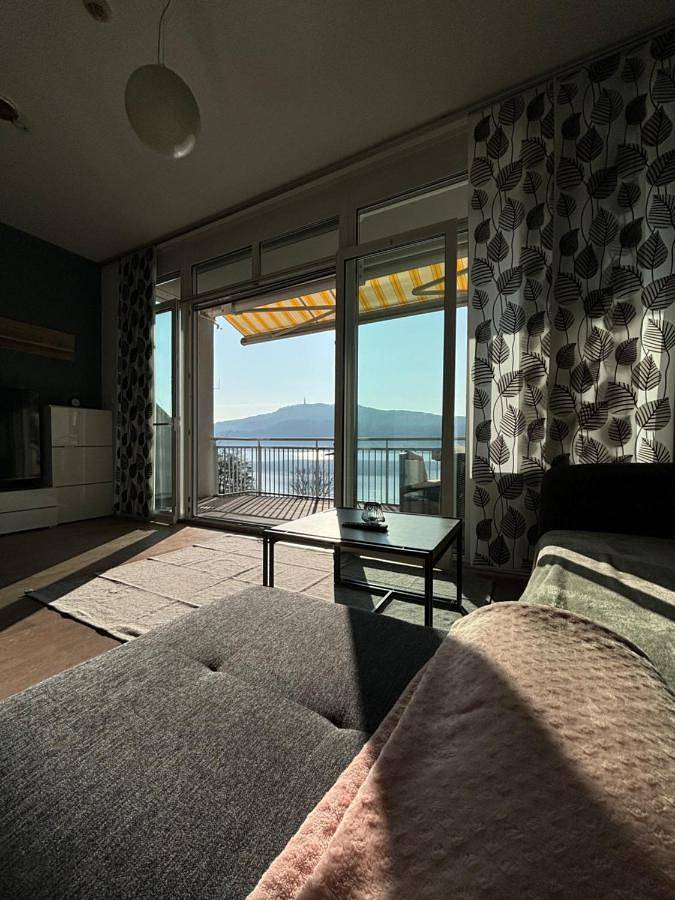 Ferienwohnung für 4 Personen, mit Ausblick und Garten sowie Seeblick