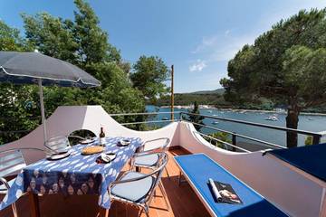 Ferienwohnung für 2 Personen, mit Balkon/Terrasse und Meerblick, mit Haustier in Porto Azzurro