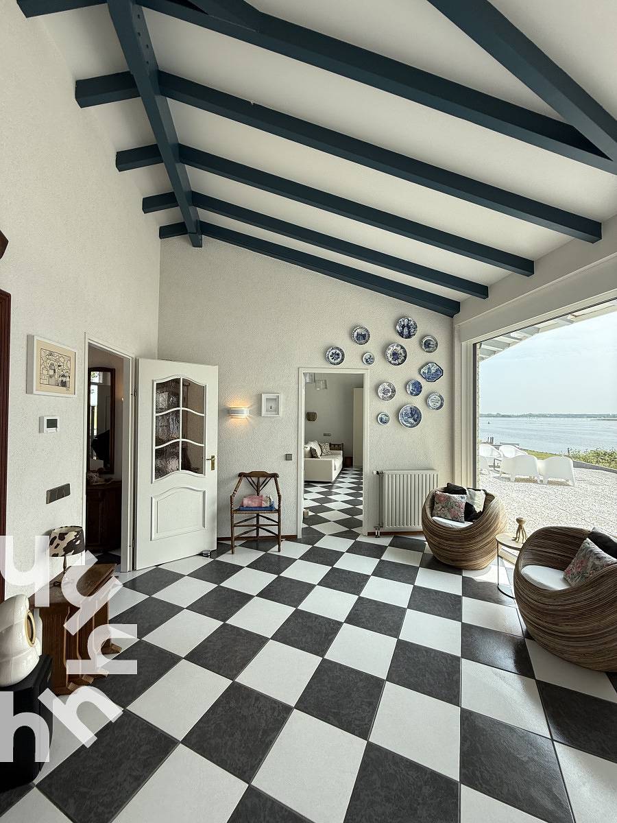 Vrijstaande 6-persoons woning aan het Veerse Meer met panoramisch uitzicht in Kortgene, Nederlandse Noordzeekust