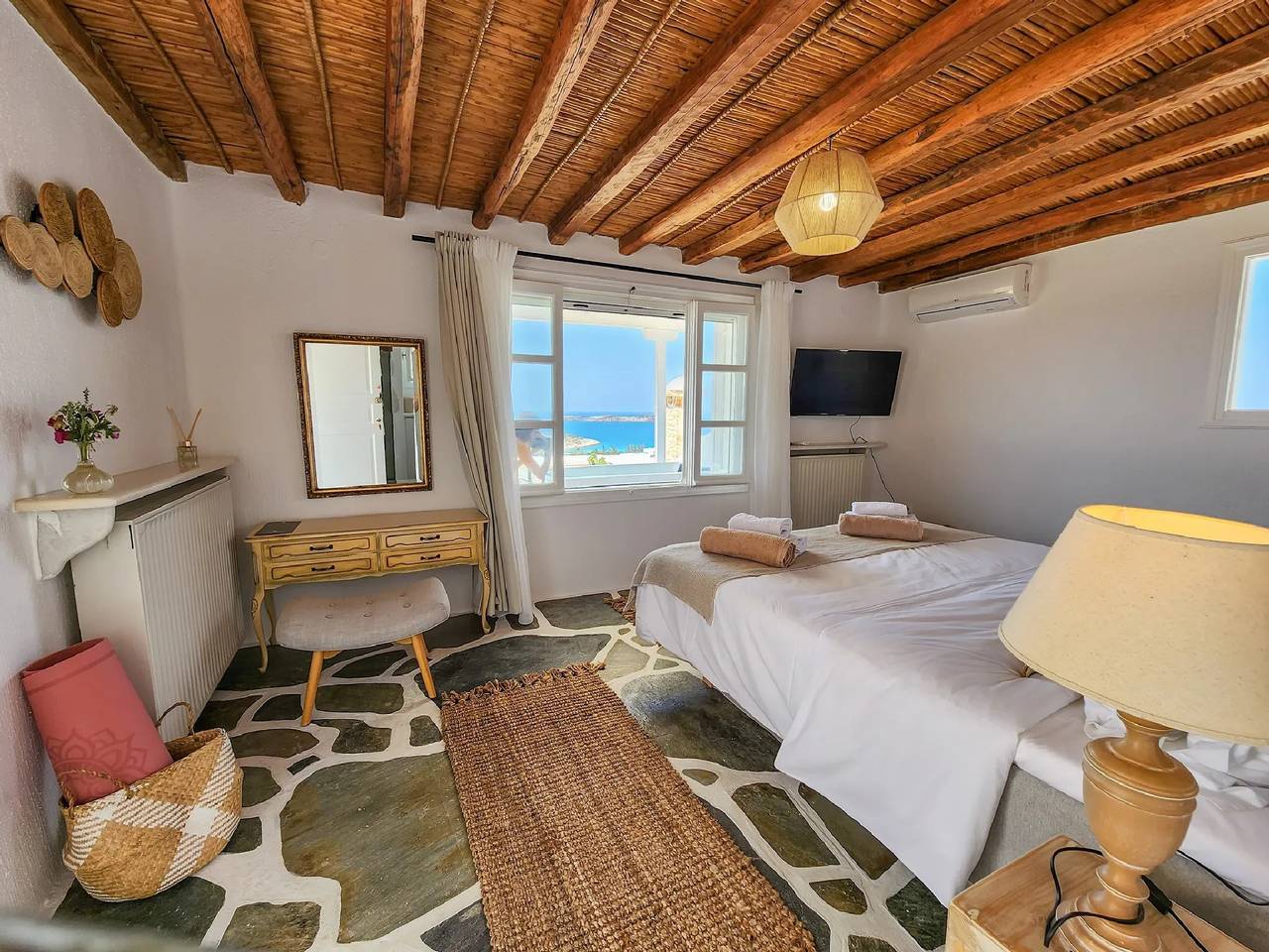 Luxury Paros Suite | Suite Orchid | Exclusive Suite with Furnished Stone Terrace and Jacuzzi | Agia Irini in Sarakiniko, Paros