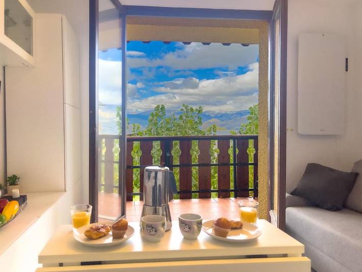 Appartement de vacances pour 3 personnes, avec vue ainsi que jardin et balcon