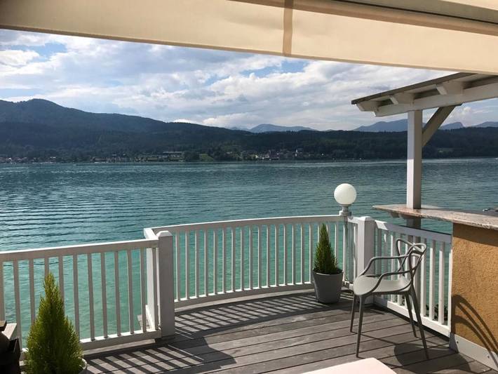 Ferienwohnung für 4 Personen, mit Balkon und Terrasse sowie Seeblick und Ausblick