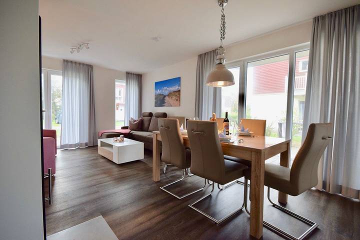 Ferienhaus mit Meerblick für 6 Personen, mit Sauna und Garten sowie Ausblick in Wangerland