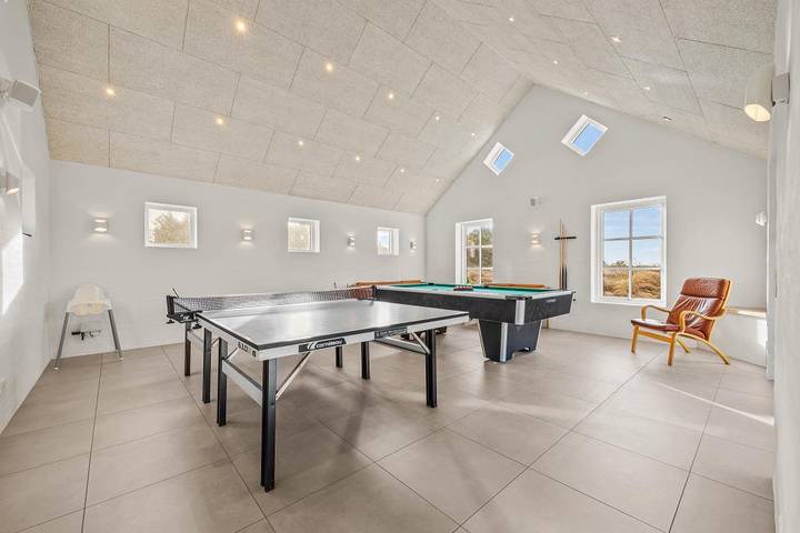 Impressive holiday home close to the beach with pool and games room in Blåvand in Blavand, Región de Varde