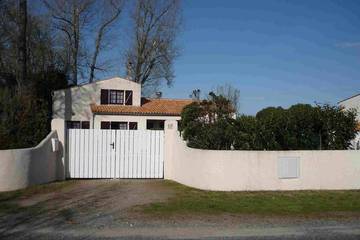 Location de vacances pour 5 personnes, avec terrasse et jardin à Le Grand-Village-Plage