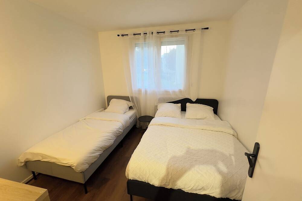 Entire apartment, Comfort and greenery: modern 2-room apartment with parking in Domont in Domont, Val-d'Oise