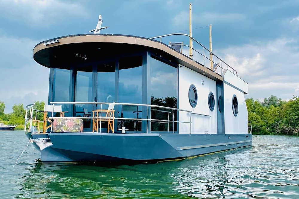 Stylische Ferienwohnung/Ferienhaus auf einem Hausboot/Yacht Nähe Roermond (Nl) in Maasbracht, Limburg (Niederlande)
