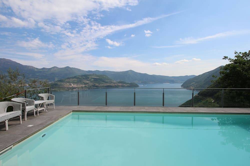 Apartamento entero, Apartamento en el lago Iseo 4/6 personas con piscina Vista al lago in Spiglia, Municipio de Parzanica