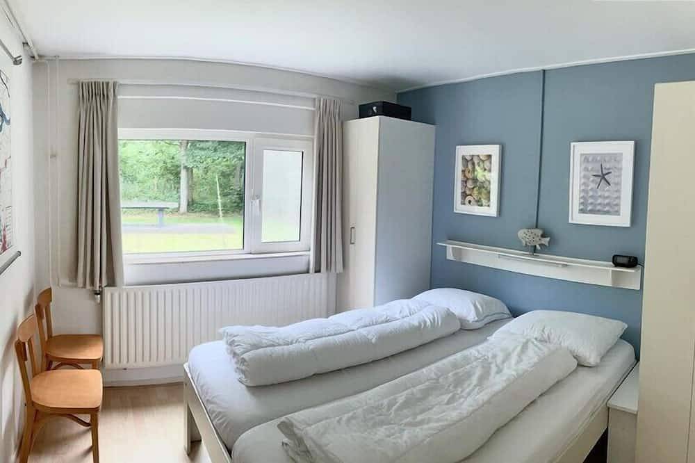 Duinoord 22 Bungalow con mucha libertad personal en un lugar verde de vacaciones in Playa de Renesse, Renesse