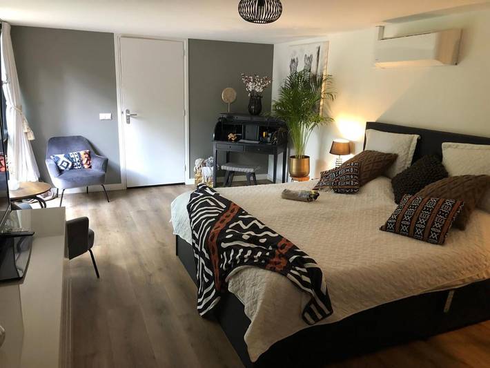 Chambre d’hôte pour 2 personnes, avec terrasse ainsi que vue et jardin dans Veluwe