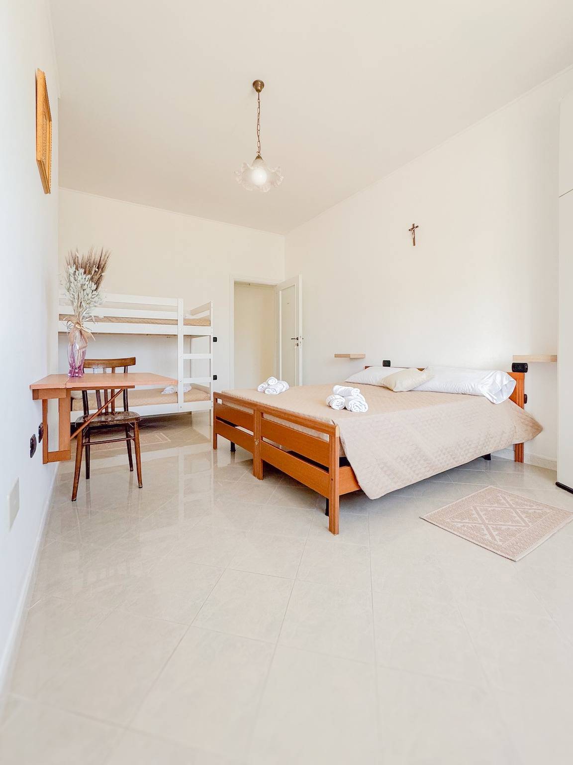 Camera familiare con bagno privato e vista mare in Gonnesa, Iglesiente