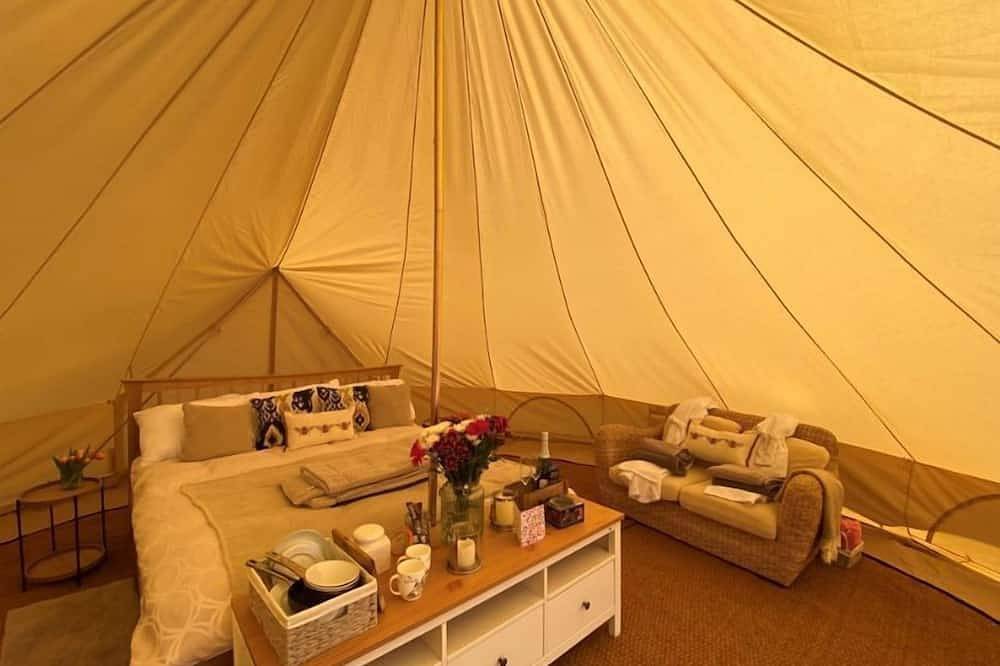 Bell tent in ultimate luxury with a wood fired hot tub, super king size bed in Stafford, Staffordshire