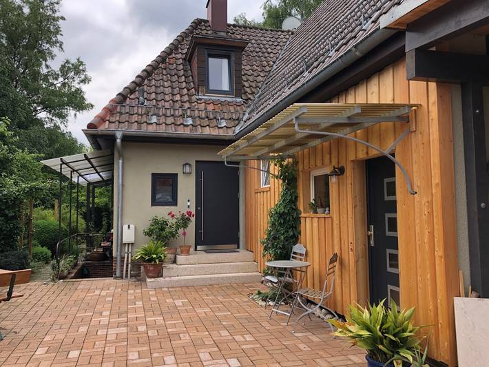 Ferienwohnung für 2 Personen, mit Balkon/Terrasse und Terrasse sowie Garten