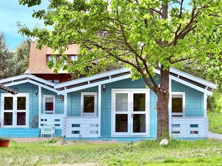 Ferienhaus für 4 Personen, mit Ausblick und Terrasse sowie Garten