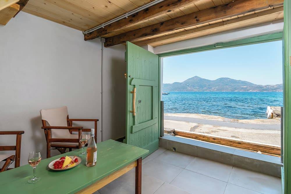 Klima Milos sea front boat house in Klima, Milos