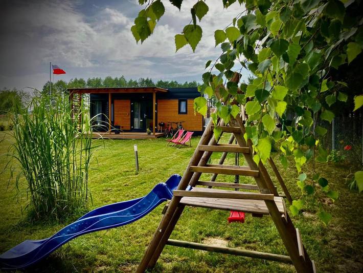 Domek letniskowy dla 4 osób, z basen dla dzieci i widok oraz ogród, zwierzęta dozwolone na Mazury