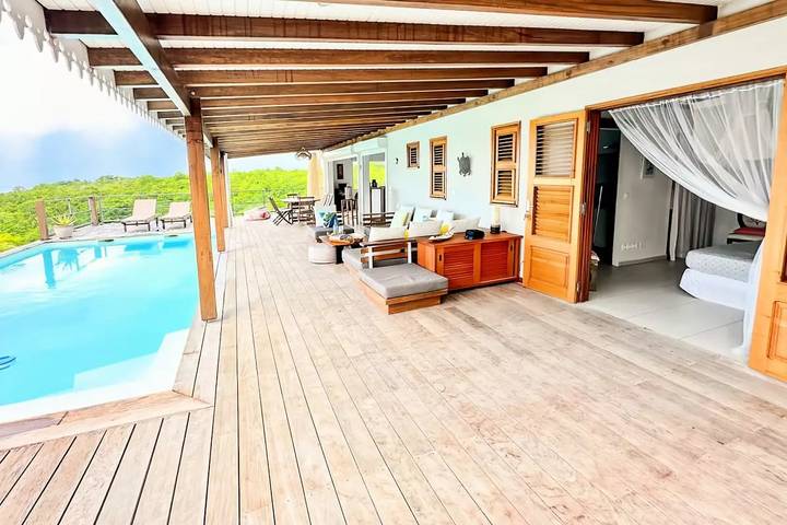 Location de vacances pour 6 personnes, avec vue ainsi que piscine et jardin dans Marie-Galante - 4