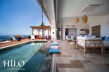 Villa pour 14 personnes, avec jardin ainsi que piscine et jacuzzi sur l' Île de la Réunion