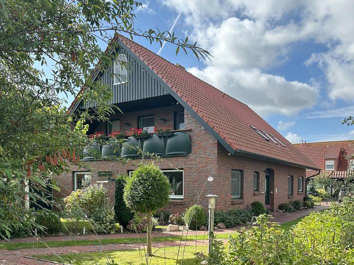 Ferienwohnung für 8 Personen, mit Balkon und Terrasse sowie Garten und Sauna in Harlesiel
