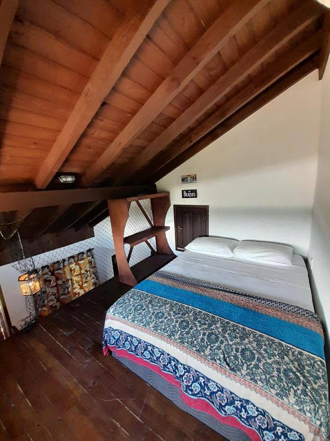 Casas e apartamentos de temporada para 4 pessoas, com vista e jardim em Imbituba