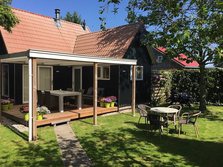 Ferienhaus für 4 Personen, mit Balkon/Terrasse und Terrasse sowie Garten