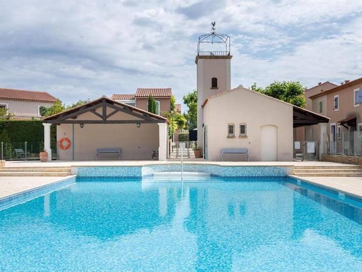 Appartement de vacances pour 4 personnes, avec Terrasse ainsi que Jardin et Piscine