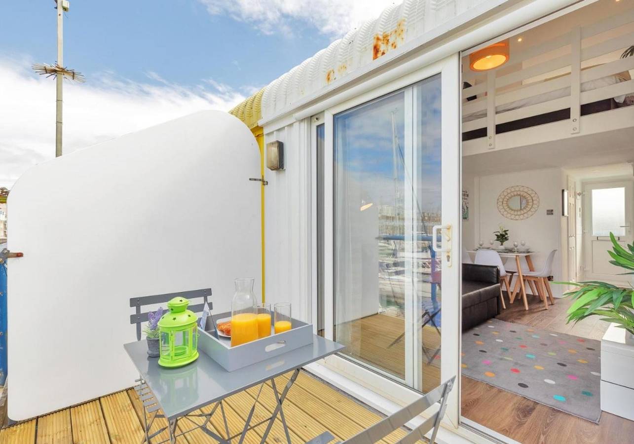 Entire apartment, On the Water 3 | waterside studio | mezzanine bedroom | terrace overlooking the harbour in Brighton Marina, Brighton