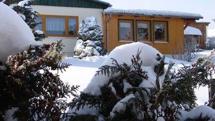 Ferienhaus für 4 Personen, mit Ausblick und Sauna sowie Seeblick und Garten, kinderfreundlich in Stiege im Harz