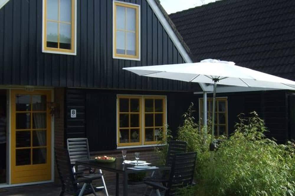 Gemütliches Ferienhaus in Oudesluis. Am Kanal und Boot mit Elektroaußenborder. in Niederländische Nordsee