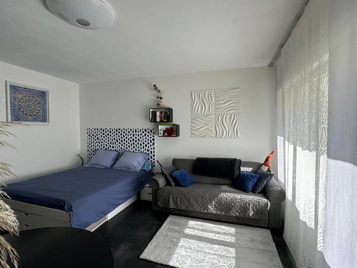 Appartement de vacances pour 2 personnes, avec sauna et jardin ainsi que vue et piscine