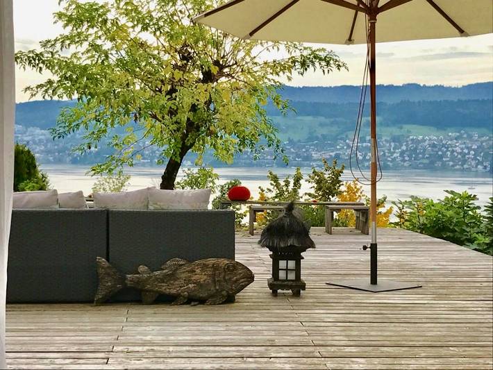 Ferienwohnung für 2 Personen, mit Terrasse und Garten sowie Pool und Seeblick