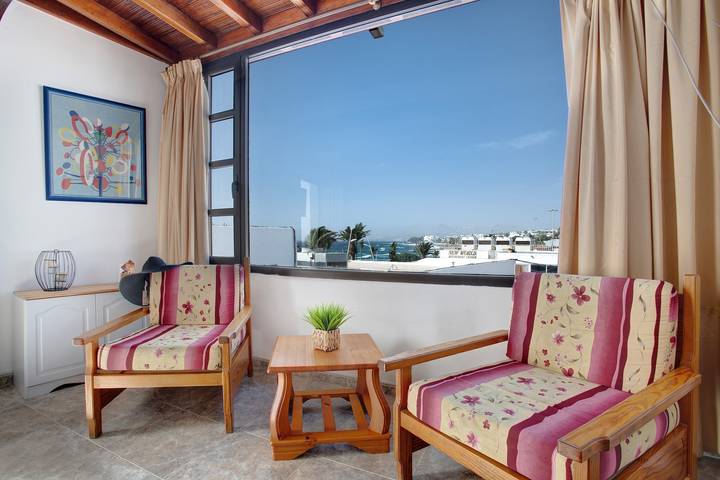 Ganze Wohnung, Ferienwohnung 'El Quintero' mit Meer- und Bergblick, Balkon und Wlan in Puerto del Carmen, Tías