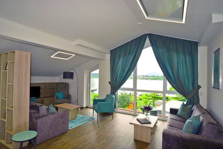 Ferienwohnung für 4 Personen, mit Seeblick und Ausblick sowie Garten, mit Haustier am Faaker See - 2