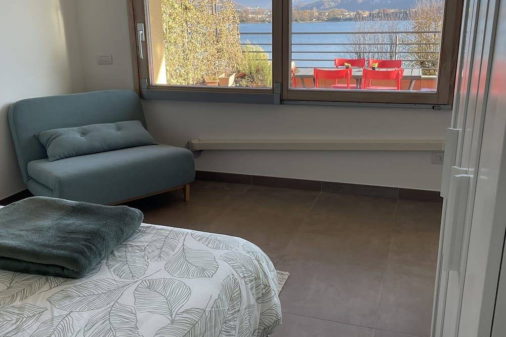Ganze Wohnung, Amazing Lakeview Terrace apartment with a panoramic view of Lake Lugano in Lavena Ponte Tresa, Luganer See (Lombardei)