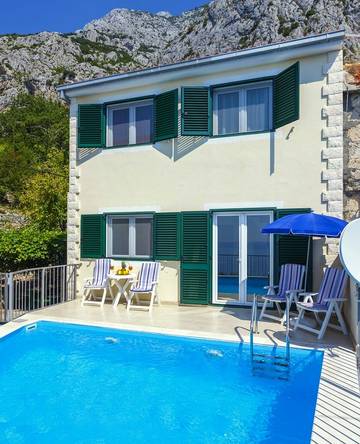 Villa mit pool für 5 Personen, mit Pool und Balkon/Terrasse in Makarska