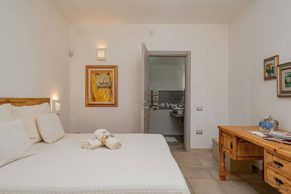 Schöne Wohnung in einem Ferienhaus für 5 Personen mit  W-Lan, Klimaanlage, Pool, Tv und Innenhof in Eden Beach, Sorso