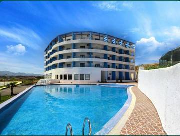 Gîte pour 2 personnes, avec jardin ainsi que piscine et vue, animaux acceptés dans Cabo Negro