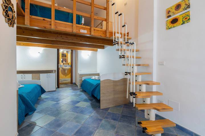 Entire apartment, Edo's Loft, Studio Apartment with Mezzanine in Lido San Giovanni, Alghero