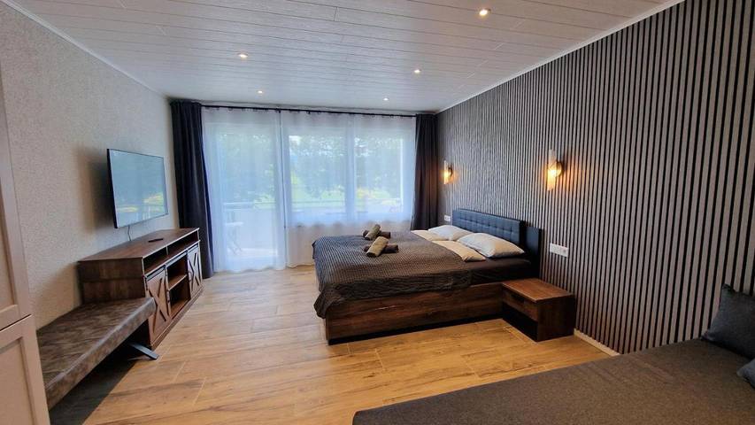 Ferienwohnung für 3 Personen, mit Balkon und Terrasse sowie Garten und Ausblick in Stiefenhofen